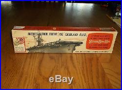 Vintage Strombecker model ship counter display with matching model kit
