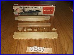 Vintage Strombecker model ship counter display with matching model kit